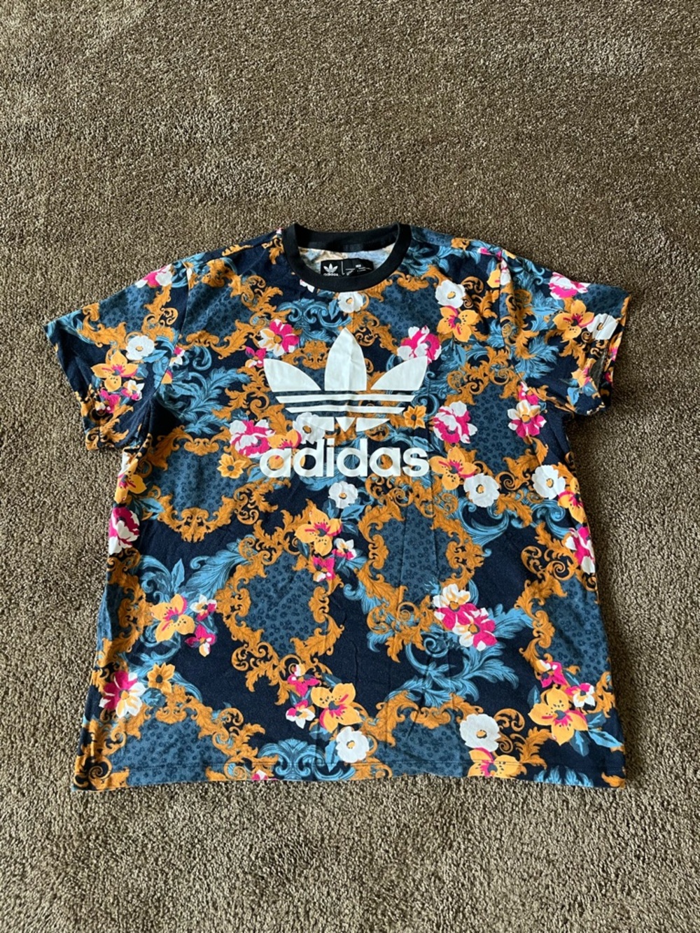 Adidas HER Studio London floral tee in women’s size XL.